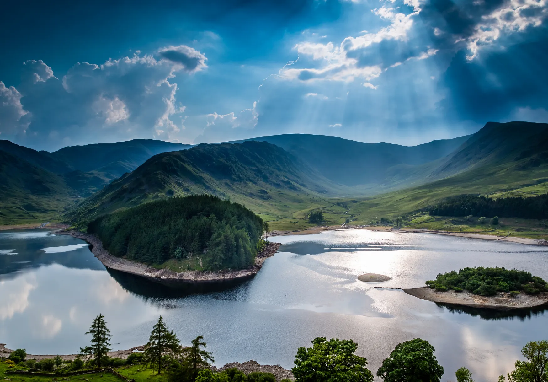 Golden hour over a Lake District tarn